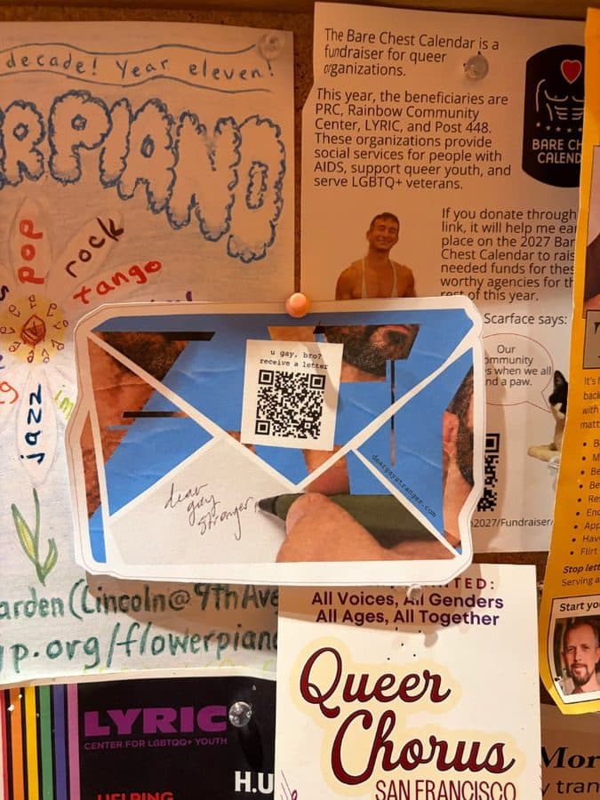 Dear Gay Stranger sticker pinned to a community corkboard